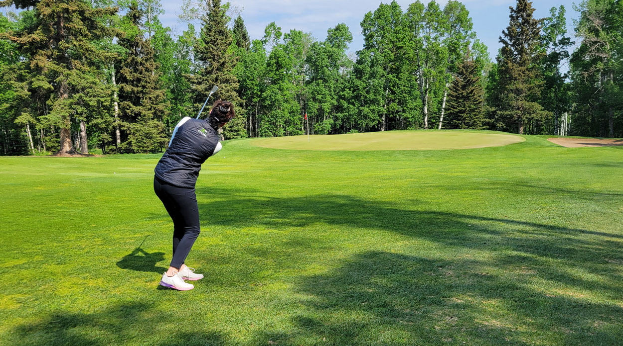 megan mckenzie golf yoga pro in Cochrane and Calgary, Alberta.
